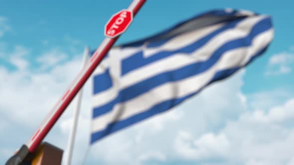 Closed Boom Gate on the Greek Flag Background