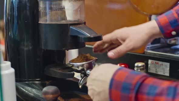 Grinding Coffee Beans in Dispenser