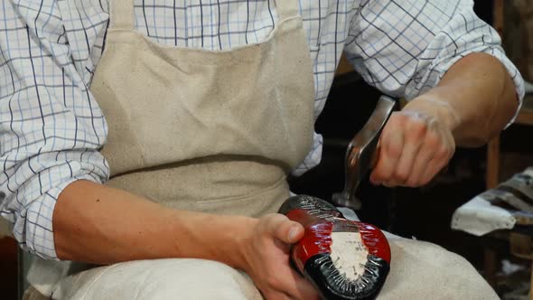 Happy Shoemaker Smiling To the Camera, While Making Shoes 1080p