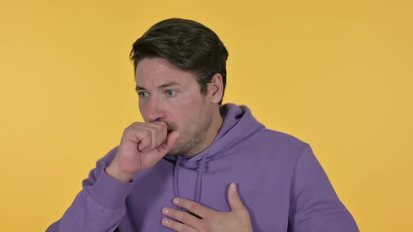 Sick Man Coughing Yellow Background