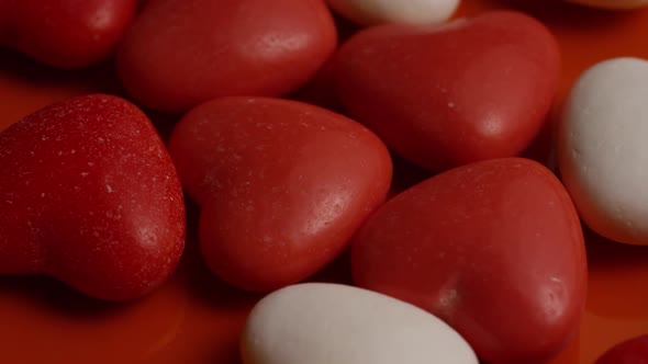 Rotating stock footage shot of Valentines decorations and candies - VALENTINES 0058