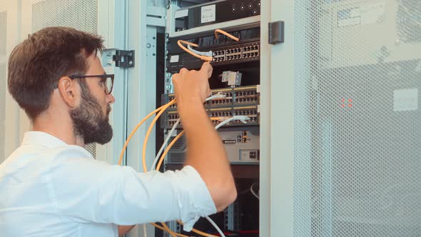 It Staff Maintenance Terminal Computer. Administrator On Computer Hardware Mainframe. Server Room.