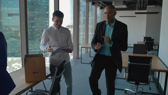 Afro-american Businessman Dancing In Modern Coworking