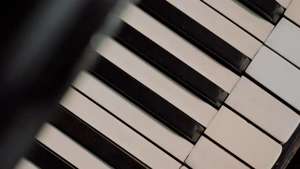 Refurbished old piano keys filmed from above