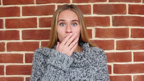 Shocked and Surprised Excited Woman in Loft Office