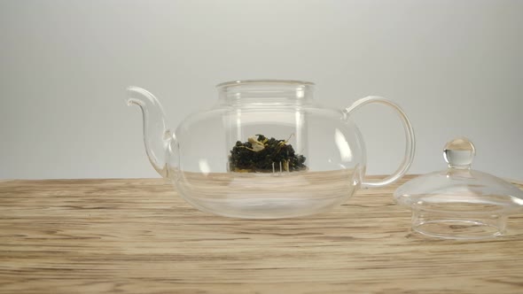 Dry White Authentic Tea in Transparent Teapot