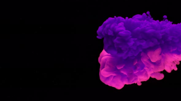 Super Slowmotion Shot of Color Inks in Water