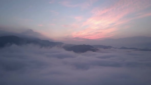 Aerial above Clouds in Summer Morning