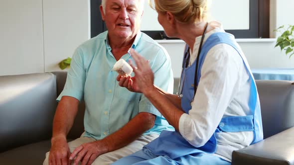 Nurse explaining how to take medicines