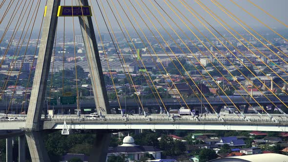 close up road and traffic on Bhumibol suspension bridge cross over Chao Phraya River in Bangkok