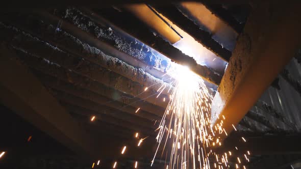 Many Bright Sparks Fly From Hot Metal During Plasma Cutting