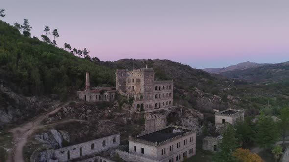 Drone aerial panorama of Termas Radium Hotel Serra da Pena at sunset in Sortelha, Portugal