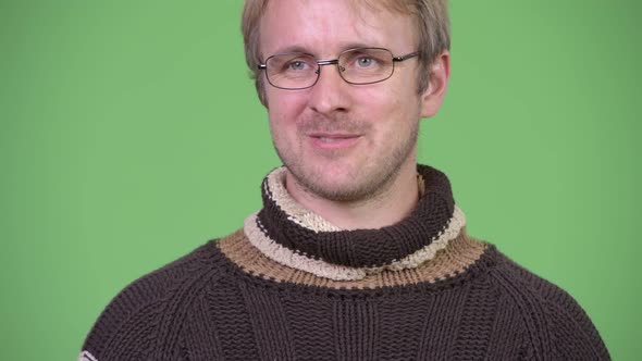 Studio Shot of Happy Handsome Man Being Interviewed