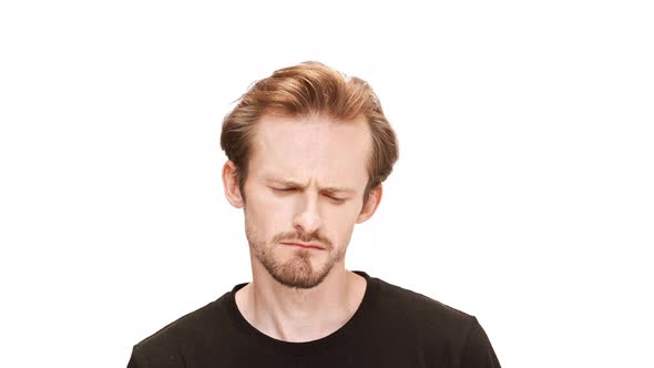 Sad Young Handsome Man Over White Background