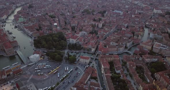 Wide aerial shot revealing Santa Croce area from above at dusk, Venice, Italy