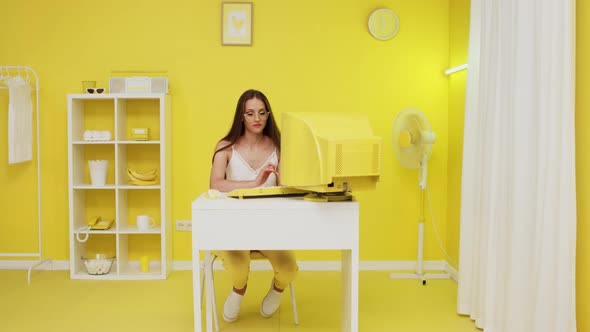 Woman Manager Is Working In Yellow Office