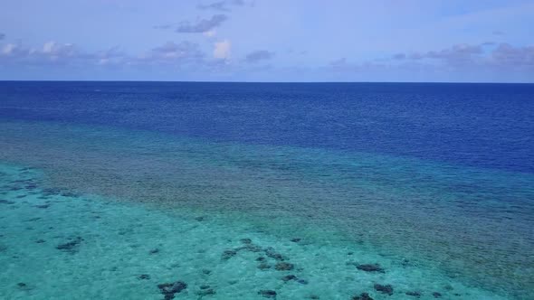 Aerial scenery of bay beach break by blue sea with sand background