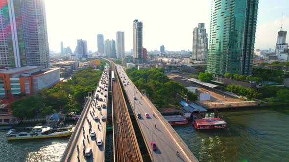 4K UHD : Bangkok River drone view. Flying over the Chao Phraya River