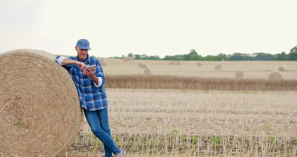 Agriculture Farmer Examining Field Modern Farming