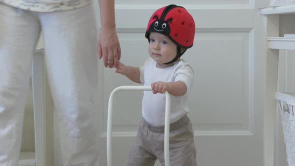 Baby Doing First Steps at Home