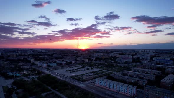 Pink Sunset Over a Small Town