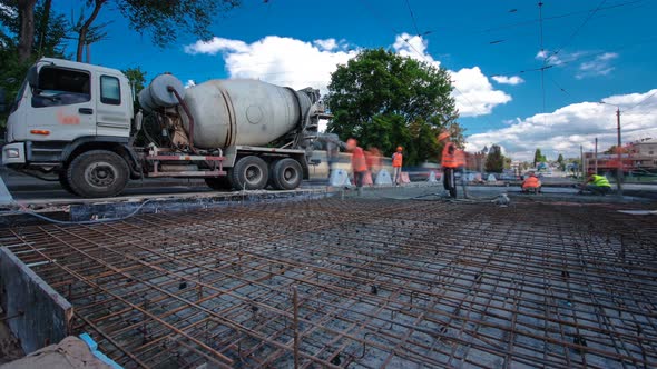 Concrete Works for Road Construction with Many Workers and Mixer Timelapse Hyperlapse