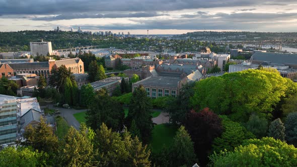 Rising aerial shot over the University of Washington's campus to reveal Lake Union and the Space Nee