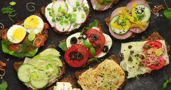 Sandwiches with Different Kinds of Toppings. Placed in Rows. Vegetable Kitchen Concept