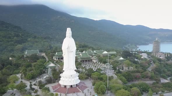 Bird Eye View Buddhist Complex on Coast Against Hills