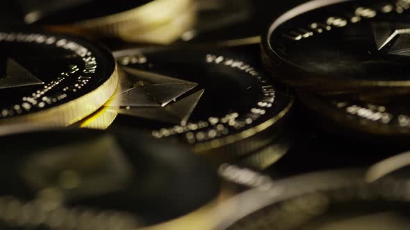 Rotating shot of Bitcoins (digital cryptocurrency) - BITCOIN ETHEREUM