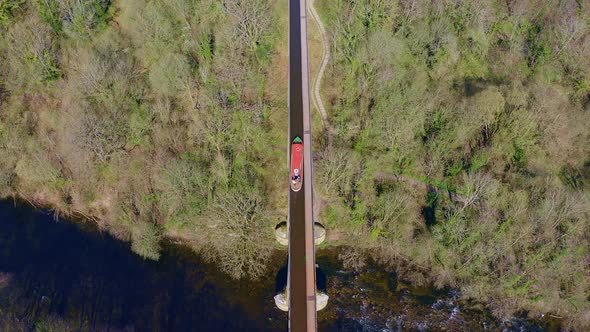 A Narrow Boat, canal boat travelling up stream on the famous Llangollen canal route towards Pontcysy