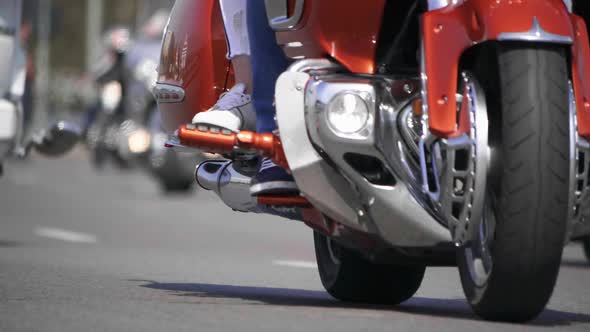 HD - Touring motorcycles. Bottom view of a Bikers riding. slow-mo