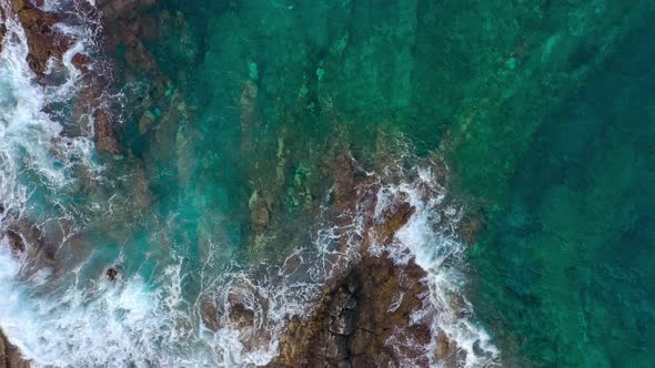 Top View of a Deserted Coast. Rocky Shore of the Island of Tenerife. Aerial Drone Footage of Ocean