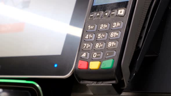 Payment By Credit Card in Front of the Terminal