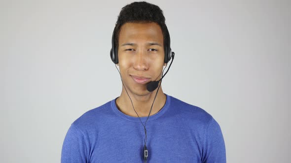 African Man Talking for Call Center White Background