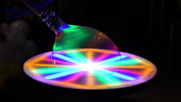 Show of Soap Bubbles with Multicolored Lighting