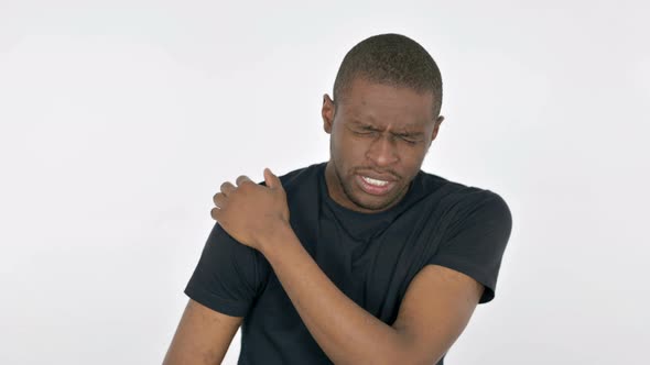 Young African Man with Shoulder Pain on White Background