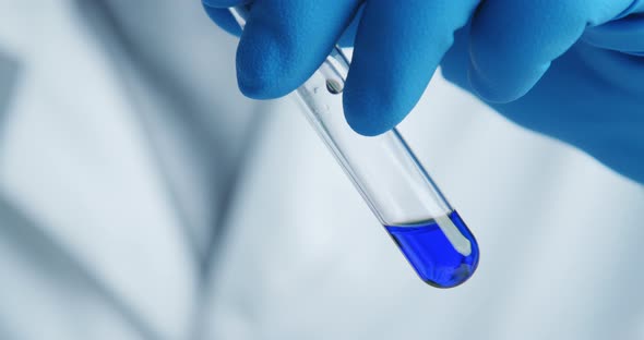 Close-up Shot with Hitting Laboratory Equipment.