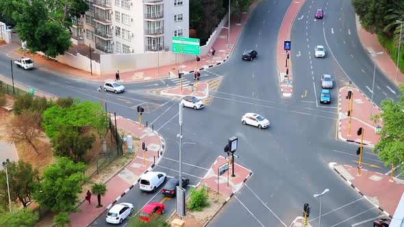 time lapse aerial shot of traffic moving through an intersection in Santon South Africa