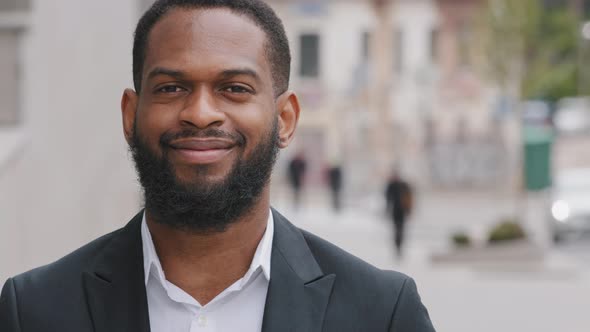 Headshot Smiling Bearded Millennial African Businessman Looks at Camera