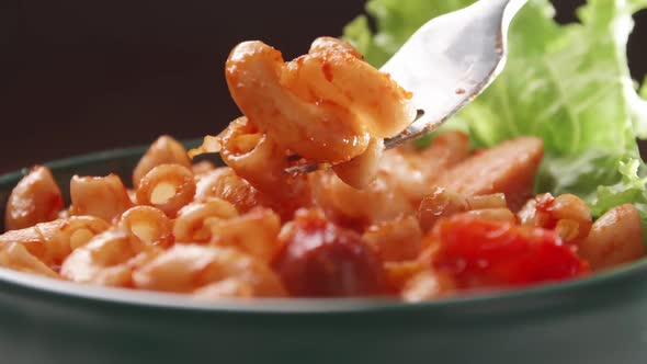 Close up of Macaroni with tomato in red sauce.