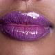 Close Up Shot on Purple Glowing Wet Makup Lips of Beautiful African Fashion Model - VideoHive Item for Sale