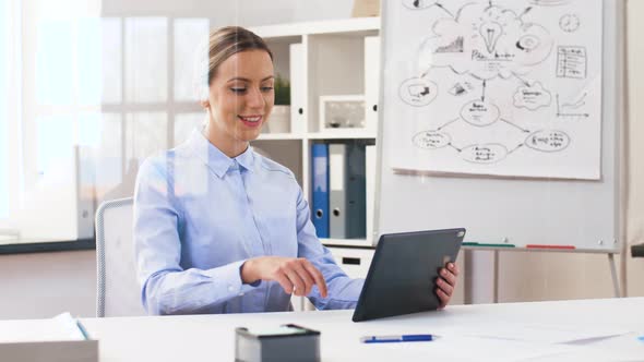 Businesswoman Having Video Call on Tablet Computer 47