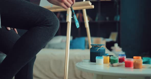 Girl Draws in the Studio