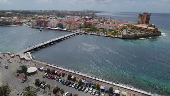 Aerial panorama of the Willemstad with Queen Emma floating pedestrian bridge