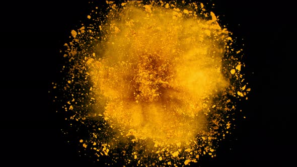 Super Slow Motion Shot of Rotating Yellow Powder Expolosion Isolated on Black Background at 1000Fps