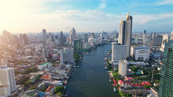 4K UHD : Bangkok River drone view. Flying over the Chao Phraya River