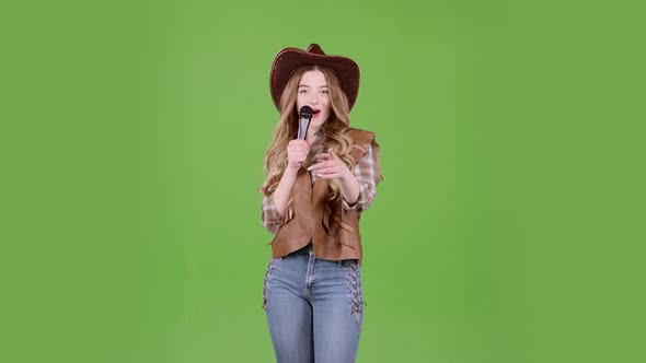Soloist Sings Country Songs and Flirts with Listeners. Green Screen