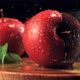 A Ripe Apple is Cut Into Halves with a Large Knife - VideoHive Item for Sale