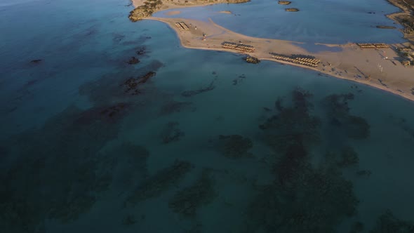 Aerial Top Down View of Sand Beach. Flyover Island in Mediterranean Sea